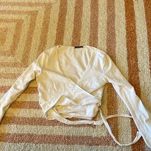 Long sleeve wrap around crop top